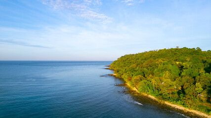 igh aerial view of azure waters, white sandy beaches and rich forest nature on Koh Kood in Thailand.