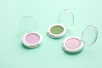 Collection of cosmetic products on color background