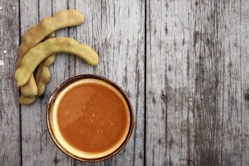 Tamarind sauce on old brown background