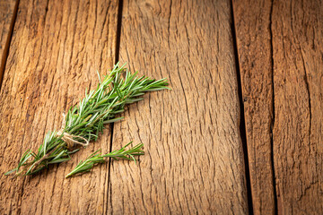 Fresh rosemary herb on the table.