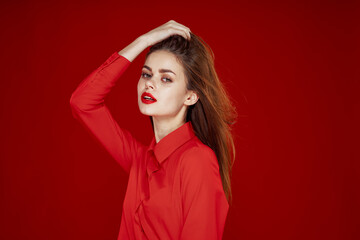 woman in red shirt posing fashion red lips fun