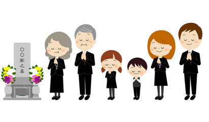 お墓参りをする喪服を着た家族（秋冬）