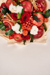 Fototapeta na wymiar bouquet with red fruits cinnamon decoration gift organic