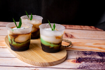 Lapis or Bubur Jongkong Indonesia's sweet porridge of rice flour, coconut milk and palm sugar syrup