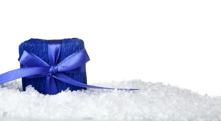 Gift box on snow against white background
