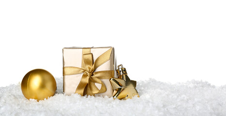 Beautiful Christmas gift and decorations on snow against white background