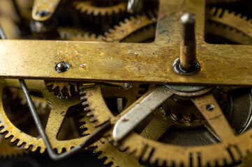 Machine is an apparatus using mechanic power and having several parts, each with a definite function and together performing a particular task. Here is the image of a machine with some parts in focus.