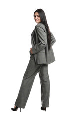 Full length portrait of beautiful woman in formal suit on white background. Business attire