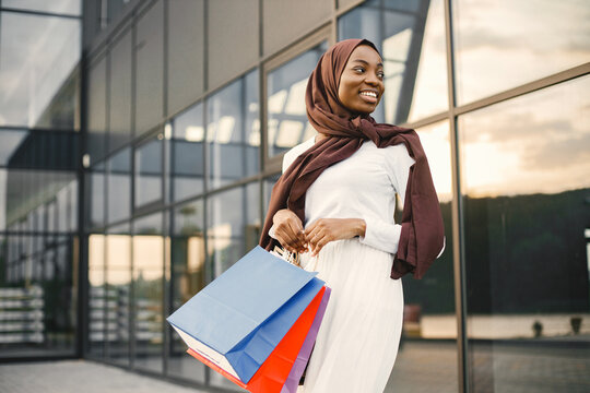 Arabic Woman Wearing Hijab Standing With Shopping Bags Near Mall