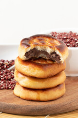 Focus on a pile of Japanese manju.