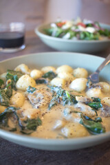 Freshly made gnocchi with mushroom and spanish