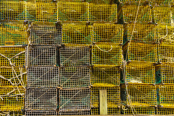 A wall of professional yellow lobster traps in the Port of Gloucester, USA, as a natural background