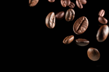 close up coffee beans on black background