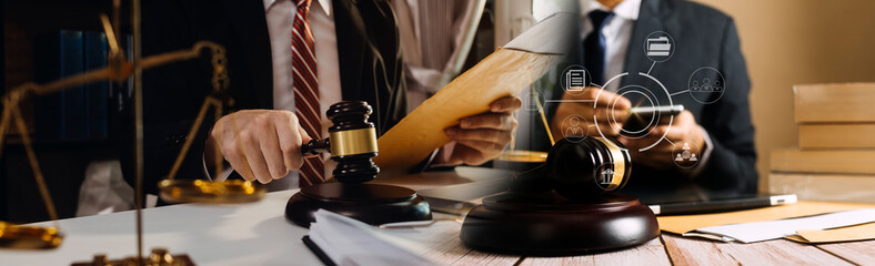 Business and lawyers discussing contract papers with brass scale on desk in office. Law, legal...