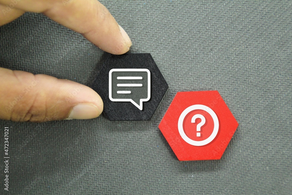 Aufkleber hexagon and hand out answer and on the question. problem solving concepts