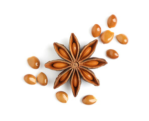 Dry anise star with seeds on white background, top view
