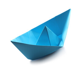 Handmade light blue paper boat isolated on white. Origami art