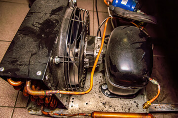 Repair of the engine of an industrial refrigerator unit. Refrigerator repair. Industrial...