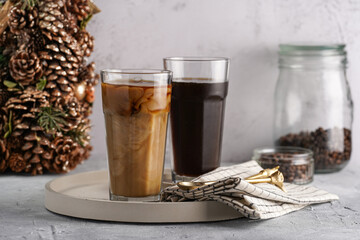 Two tall glasses with cold coffee with milk - iced cappuccino frappuccino
