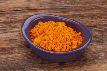 Tumeric powder in the bowl