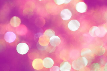 Beautiful natural bokeh of the colorful lights. Abstract Christmas New Year backdrop for text or advertising. Template for banner or party invitation