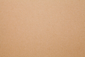 Fototapeta na wymiar Close-up of brown kraft paper texture background