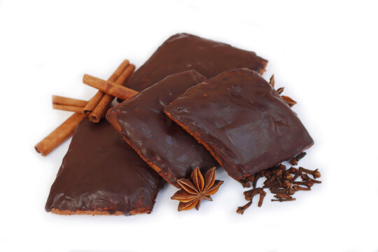 Italian traditional festive cookies called Mostaccioli or Mustaccioli  isolated on white background. Christmas cookies made mith Pisto, a mix of various spices