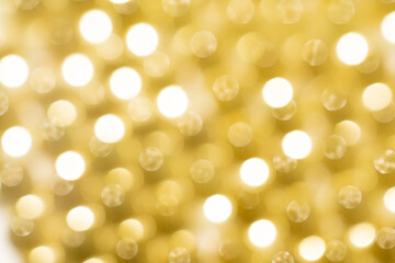Obraz premium out of focus. background. yellow gelatine capsules. pharmaceutical production. 
