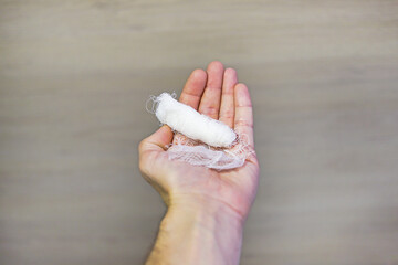 A helping hand always holds out a bandage to the patient