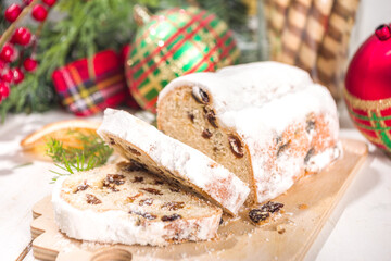 Homemade Christmas stollen, Xmas and New Years festive traditional baking fruit cake