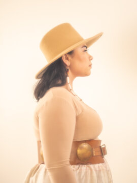Young Indigenous female model indoors