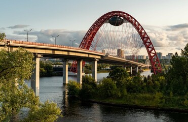 Obraz premium Beautiful bridge over the river in summer