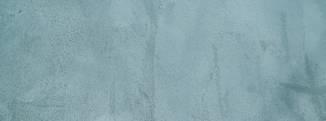 Gray cement plaster. Wall texture for background. Brush scratches on the wall