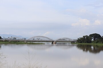 Plakat bridge over the river in kedah malaysia
