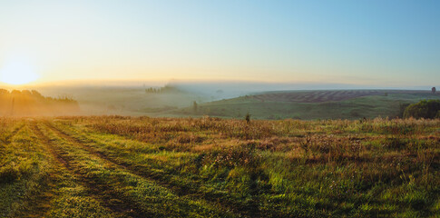 Fototapeta na wymiar Sunrise over the fields