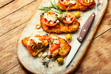 Pork schnitzel with olives