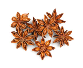 Dry anise stars with seeds on white background, top view