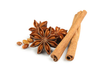 Dry anise stars and cinnamon sticks on white background