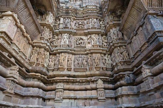 VISHWANATH TEMPLE: North wall . Top and middle panel Mithuna couple erotic panel and bottom deity panel.&nbsp; Khajuraho, Madhya Pradesh, India, UNESCO Site&nbsp;