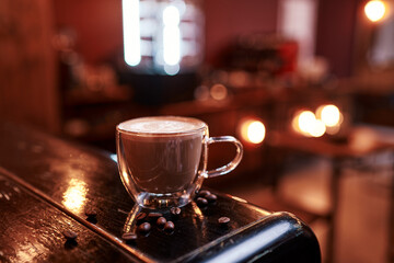 Cup of cappuccino cofffe in cafe.