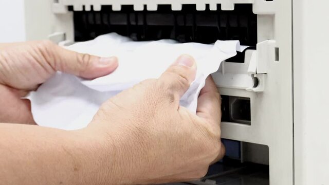 Paper Stuck, Paper Jam In Printer At Office concept office equipment problem
