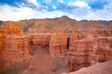 Fototapeta na wymiar Natural unusual landscape red canyon of unusual beauty is similar to the Martian landscape, the Charyn canyon