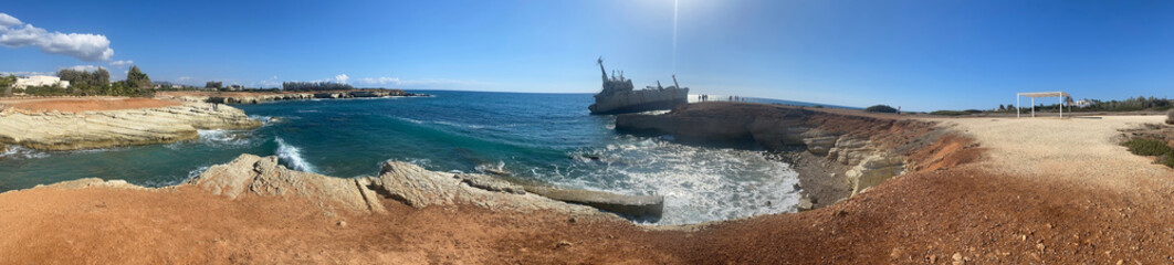 photo background panorama, an old rusty ship stranded off the coast of Cyprus, in the Paphos region