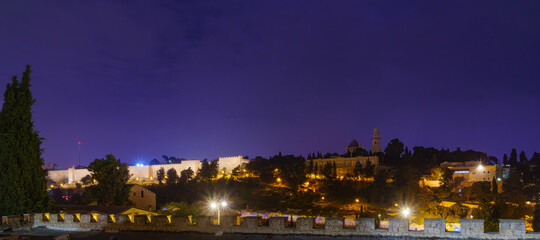 Fototapeta na wymiar Night view of old city walls, and Dormition Abbey, Jerusalem