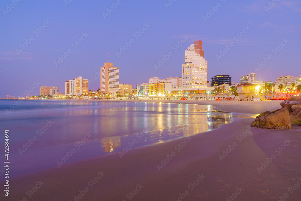 Wall mural blue hour view of the beach and hotels buildings. tel-aviv