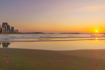 Fototapeta na wymiar Sunset view of the coastline of Tel-Aviv and old Jaffa