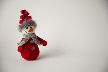a snowman waiting for the new year on a white background