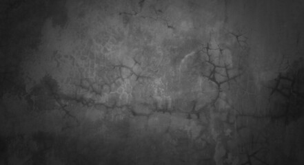 Texture of dark gray concrete wall, Texture of a grungy black concrete wall as background.