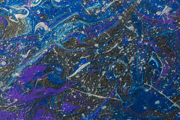 Abstract space blue purple silver black background. Acrylic painting fluid art. Night waves of the ocean. Conceptual art drawing. Fashionable background for design. Modern art, original drawing