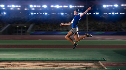Long Jump Championship: Professional Male Athlete Jumping on Long Distance. Determination, Motivation, Inspiration of a Successful Sports Man Setting New Record Result. Competition on Big Stadium.